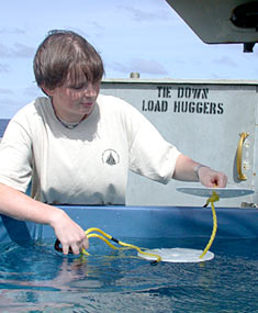 Graduate student, Rhian Waller, uses the ship&rsquo;s &ldquo;pool&rdquo; to test the design of markers that will be left on the seafloor at hydrothermal vents sampled by Alvin.