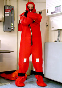  Lonny Lippsett tries out a survival suit, commonly known as a &ldquo;gumby&rdquo; suit.