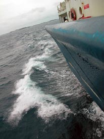 The view from the port side of R/V Atlantis. Past the bit of land in the background of this photo, the waters got choppier.
