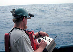 At 6.30 a.m under partly cloudy skies, ABE resurfaced after its 15-hour dive. WHOI scientist Al Duester guides ABE back to the Atlantis with a remote control. Within minutes, ABE was safely on board. 