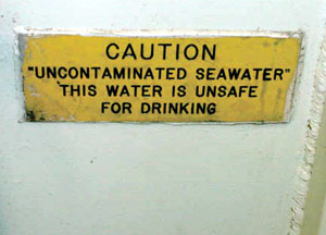 This water may be unsafe for drinking, but on board we're drinking seawater all the time. Not straight from the ocean, however. Instead, the ship treats seawater through two processes: reverse-osmosis or flash-evaporation, which uses heat from the engine to evaporate the water and separate the salt and other minerals from a now-distilled water. After this, it's clean for drinking or washing.  