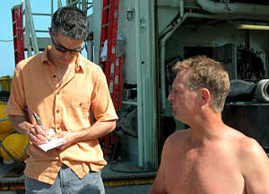 Dive and Discover writer Joe Appel interviews ship steward Carl Wood just before Carl hops into the Avon to be a swimmer during an Alvin recovery. 