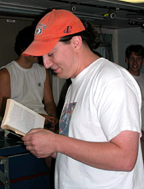 Chief Scientist Jess Adkins reads from Ovid's tale of Medusa during the crew's humble offering to Poseidon this evening. 