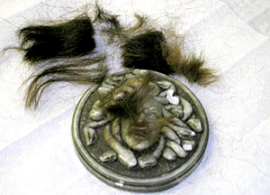The final package: Jess Adkins' Medusa medallion, and 30 different shocks of hair are ready for an offering to Poseidon. 