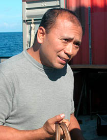 Alvin pilot-in-training Noel Masias, after today's dive. On a so-called "PIT" dive, Alvin is co-driven by the pilot and pilot-in-training. Alvin holds three people so only one scientist dives as an observer on a "PIT" dive. Most trainees take more than a dozen training dives before becoming pilots.  