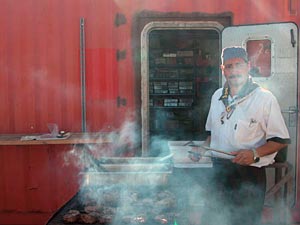 Al, on fire. Ship cook Al DaLomba, through the smoky haze of the cookout. A lot of us truly couldn&rsquo;t remember when we&rsquo;d had better steaks. 