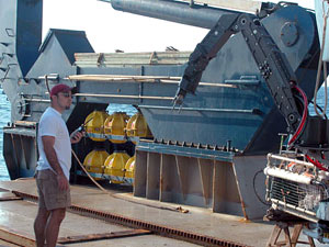 Alvin pilot Tony Tarantino double-checks the sub's brand-new mechanical arm before this morning's launch. The Predator, as it's called, performed flawlessly on its maiden voyage. 
