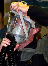 All researchers planning to dive in the submersible Alvin, including Mike Tryon, a post doctoral scholar in geology at the Scripps Institute, were required to try on the sub’s emergency oxygen masks during a safety meeting Sunday evening. “They look really corny, but they could potentially save your life,” said Bruce Strickrott, a pilot of the submersible.