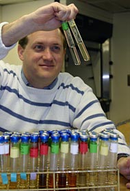  In an Atlantis science lab, Jim Holden of the University of Massachusetts grows microbes collected from hydrothermal vents on the seafloor. These thermophiles thrive in high-temperature sulfides and fluids, as hot as 200&deg;F (95&deg;C).