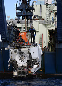 The research vessel Atlantis waits at the dock in Portage Bay at the School of Oceanography on the University of Washington campus in Seattle. 
