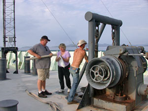 Bosun Wayne Bailey (gray shirt), chief mate Mitzi Crane, and seaman Kevin Threadgold successfully freed wire tangled in the anchor, allowing us to begin steaming from Costa Rica through the Gulf of Nicoya into the Pacific Ocean.
