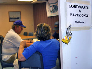 Throughout the ship are reminders to keep food and paper waste separate from non-degradable items. (Photo by Amy Nevala)