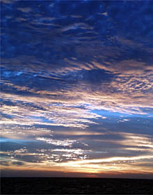   The beautiful reddish colors common to Baja sunrises are due to small particles of dust in the air.  