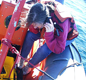  George Luther prepares chemical sensors for the next day’s dive.  