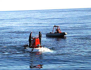 The final recovery of Alvin was made in mirror-like seas. It was a perfect ending to an exciting series of dives. 