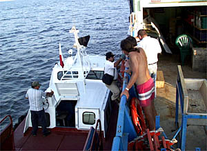The Pilot boards R/V Atlantis on the port side, just aft of the ROV hanger. 