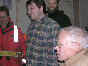 In the ship�s dry lab, where the LAPIS computer system is set up, (from left) Erich, Josh, Byron, and Larry are pleased by the quality of images of jellies the instrument takes as it is towed. (Photo by Kate Madin, WHOI)