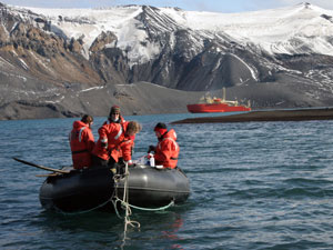 Dec     From left, Brenna, Marine Technician Jamee, Wally, and Lena prepare to clean off and sample whale bones. (Photo by Jun Nishikawa, University of Tokyo)