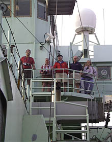 Katie Wilson and Ed Popowitz haul in the lines after they are cast off from the dock. 