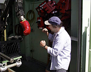 Dana Yoerger mixes it up with Alvin’s port manipulator. Dana will be one of the observers on tomorrow's dive along with Jim Cochran and Pilot Bob Waters. 