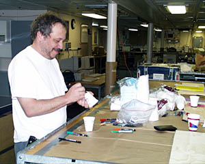 Dana Yoerger decorating Alvin shrink cups last night before his dive.
