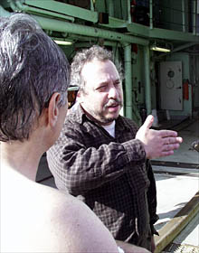 Dana demonstrates the special top-secret handshake of Alvin divers. 