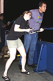 It’s a big one! As UCSB graduate student Kate Gans struggles to land a tuna fish, Clint Engledow, Melville’s 3rd Engineer, provides encouragement and advice. Keep the slack out of the line! 