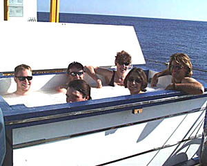 After the mid-watch finishes their afternoon shift in the Control Van at 1600 hours, they retire to the Melville’s hot tub to relax and enjoy the sunlight and ocean views. Because of their watch schedule, this is the only time of the day that they see the sun. Clockwise from the left are: Tim Head, Paul Johnson, Rachel Haymon, Gregg Kurras, Clare Williams, and Tim Haskell.