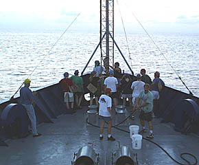 The Pollywogs (those who have not crossed the Equator on board ship before) are summoned to the bow of R/V Melville at dawn by King Neptune’s Trusty Shellbacks (those who have crossed the Equator before). Let the ceremonies begin! This tradition has been passed down among seafarers from generation to generation since olden times.