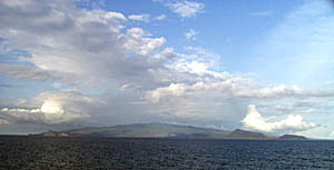 A spectacular view of the broad, cone-shape of the shield volcano on San Salvador Island as R/V Melville sped past at over 13 knots.