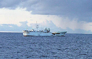 The “Maru #18”, a Japanese fishing vessel, came within 1 nautical mile of R/V Melville late this afternoon. It was hauling in its long-line fishing gear that was across our track while we towing the DSL-120 sonar. The ship was hauling in sharks it had hooked as it passed us. Dave Murline, Melville’s First Mate, was on the Bridge, and checked them out through his binoculars. He thought that the sharks looked like either Mako or Blue Sharks.