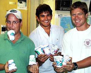 Erin Todd (left), Jon Burgess (middle), and Ben Wigham proudly show off their styrofoam cup designs. 
