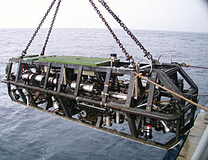 Argo II being hauled on board the R/V Melville this afternoon during a tropical rain squall.