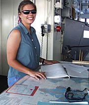 Anja plots a position on the Bridge during her 0800-1200 hours watch. 