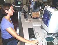 Clare proofreads the Dive and Discover Web site, which we also get to see onboard R/V Melville. It takes about 18 hours after we send information back to Woods Hole Oceanographic Institution before we see the daily Web updates. You get to see them before we do. 