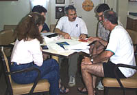 Dan discusses some of the bathymetry data collected with the DSL-120 sonar with his colleagues. 