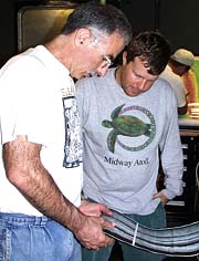 Mike and Paul Johnson in the Control Van studying the latest sonar images of the volcanic seafloor we have been surveying the past few days.