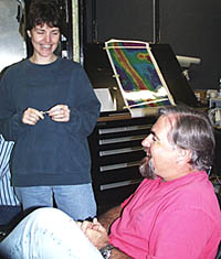 Maya is the watch leader on the 0400-0800 hours watch. Here she discusses the progress of Argo II operations with PJ Bernard of the WHOI Deep Submergence Operations Group. 