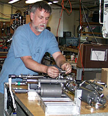 Eric Olson assembles hydrothermal fluid sampling devices.  