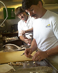  Captain AD Colburn and Cook Chris Poulin pitched in to help Geologist Dan Fornari prepare tonight’s Italian feast.  