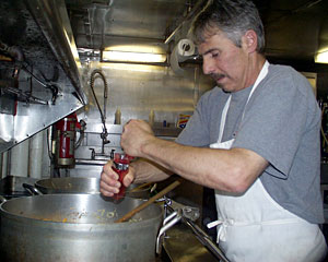 Grinding black pepper instead of rocks is Geologist Dan Fornari, who made three pasta sauces as well as chocolate mousse for Knorr’s 58 scientists and crew members. 
