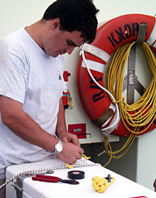  DSOG tech Mark Bokenfohr rigs lines to close the lids of the sampling boxes on the new elevator.  