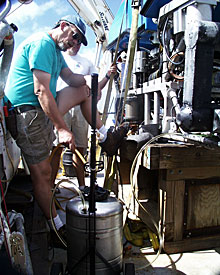 Chief Pilot Will Sellers adds oil to ROV Jason before the vehicle’s first visit to Knorr Seamount this afternoon.  