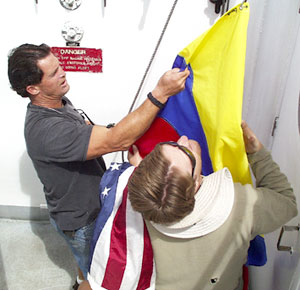  Before pulling into Puerto Ayora, Galápagos, the Ecuadorian flag was hoisted (yellow stripe uppermost), along with US flag.  