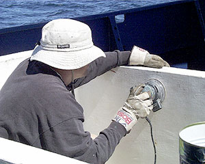 A few last minute repairs and Eric Wakeman, the Chief Mate, will soon have the pool up and running.