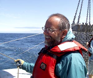  JJ Becker holds the tag line tight as the dredge is readied for deployment. 