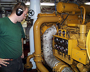  Tim McDaniel, Oiler, is preparing to put another engine on line as a backup. 