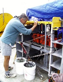 Dan Fornari checking the batteries on the towed camera.  