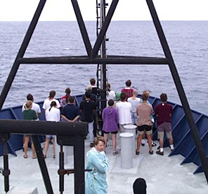 At 5:30am all the Pollywogs were collected and taken to the bow to watch for King Neptune and the Equator. 