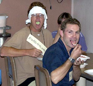 Big Red Petro (Dennis Geist) and Spanky (Sean Mix) show off the Pollywog breakfast of green eggs and chili oatmeal. 